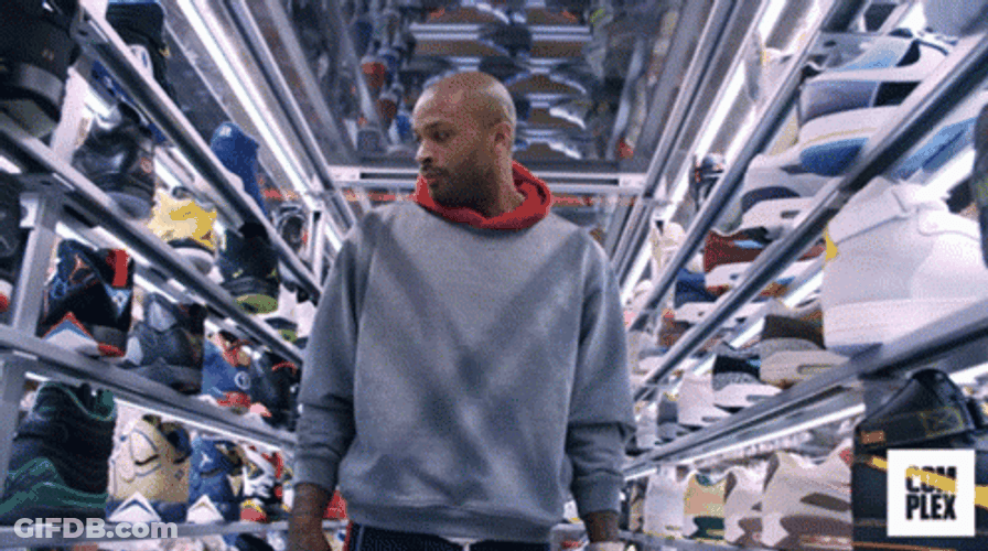 PJ Tucker Checking Out Sneakers GIF