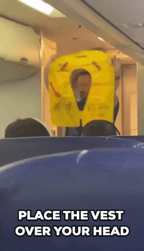 Place The Vest Over Your Head GIF