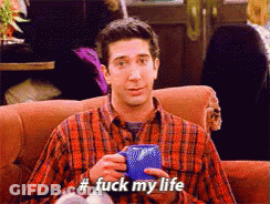 Plaid Shirt Man On Couch Holding Blue Mug Fuck My Life GIF