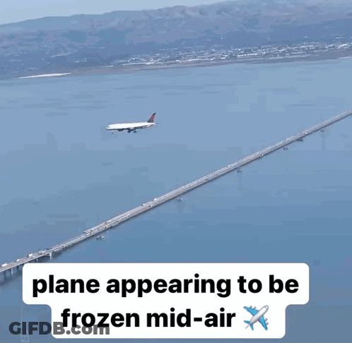 Plane Flying Over Bridge GIF