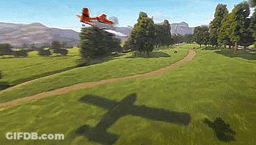 Plane Flying Over Grass Field GIF