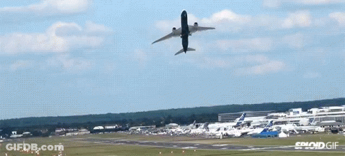 Plane Flying Over Runway With Sploid GIF