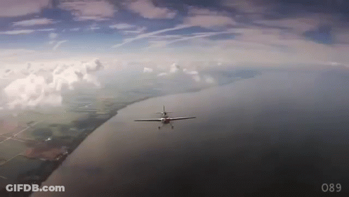 Plane Flying Over Water Number 089 GIF