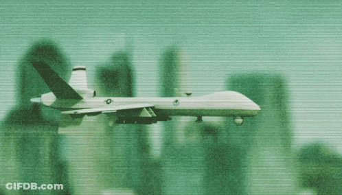 Plane With Letter O On Tail Flying Over City GIF