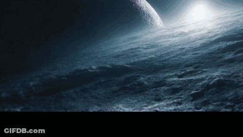 Planet Above Cloudy Surface GIF