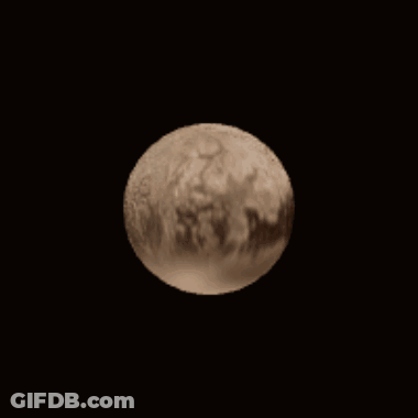 Planet And Smaller Planet Floating In Dark GIF