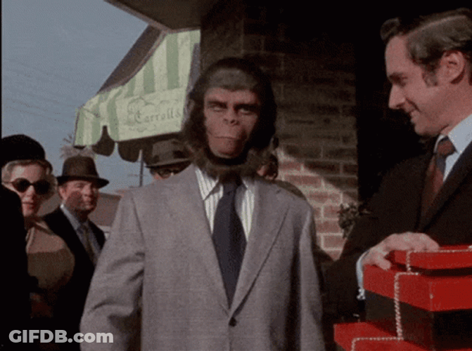 Planet Of The Apes Monkey On Suit GIF