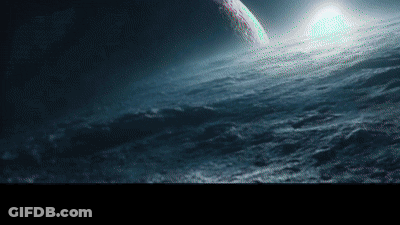 Planet Visible Over Dark Ocean GIF