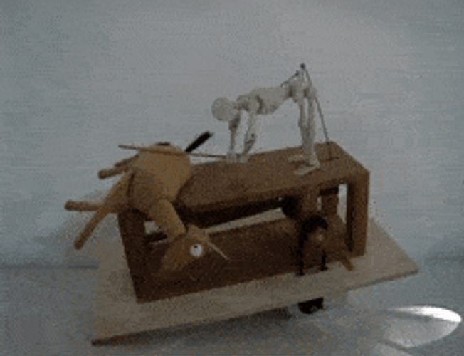 Plastic Man Beating A Dead Horse GIF