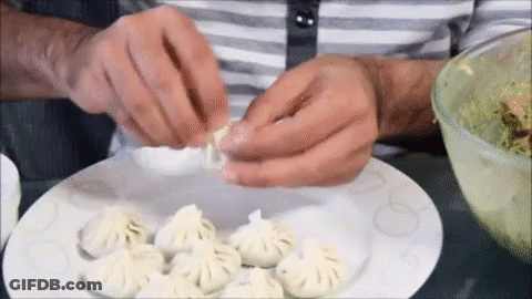 Plate Of Dumplings On Checkered Plate With TikTok GIF