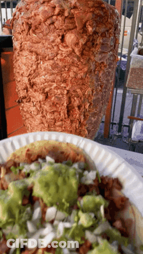 Plate Of Food With Meat Skewer GIF