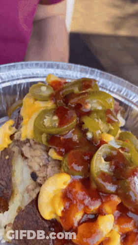 Plate Of Food With Sauce And Jalapenos GIF
