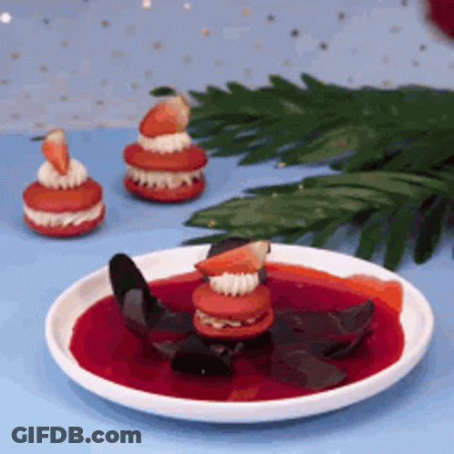 Plate Of Food With Strawberry On Blue Table GIF