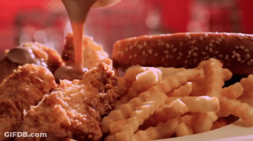 Plate Of Fried Chicken, French Fries, And Pretzel GIF