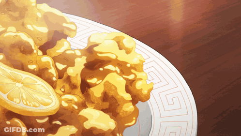Plate Of Fried Food With Lemon GIF