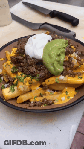 Plate Of Guacamole And Sour Cream GIF