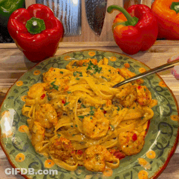 Plate Of Noodles And Shrimp With Fork GIF