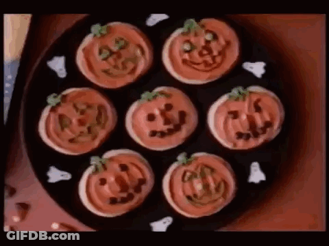 Plate Of Pumpkin And Ghost Cookies GIF