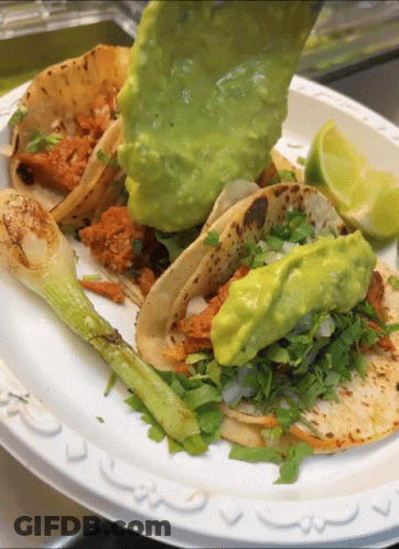 Plate Of Tacos With Guacamole And Limes GIF