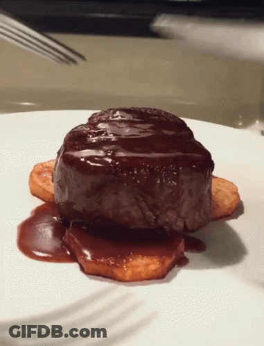 Plate With Steak And Potatoes In Chocolate Sauce GIF