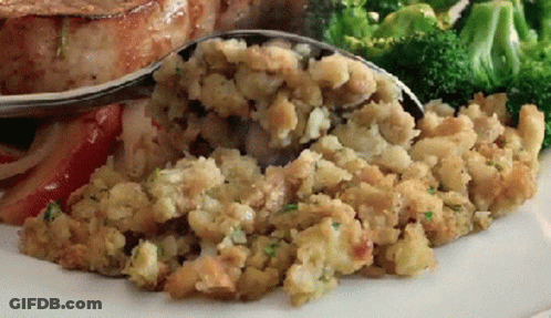 Plate With Stuffing, Broccoli, And Spoon GIF