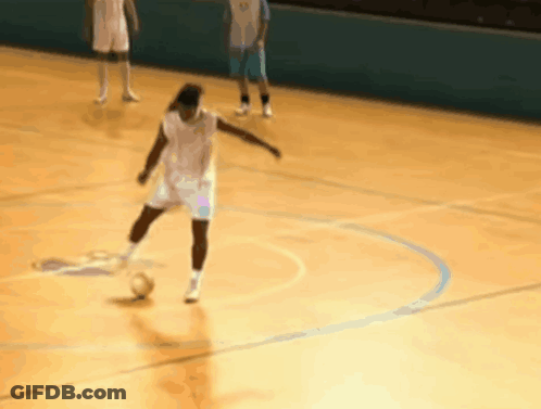 Player Kicks Ball, Another Watches GIF