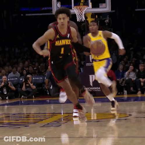 Player Number 1 For The Hawks Is Dribbling The Basketball GIF