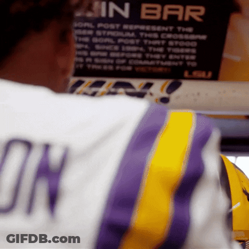 Player Of Ed Orgeron Touching Win Sign GIF