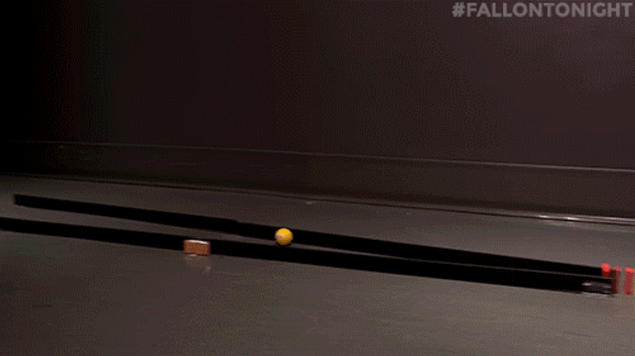 Playful Red Yellow White Dominos Falling GIF