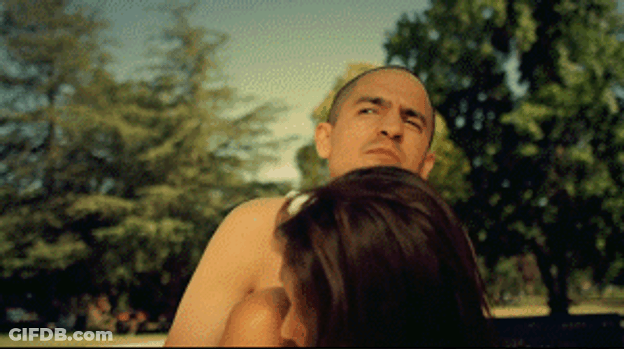 Playground Couple Riding Spring Toy GIF