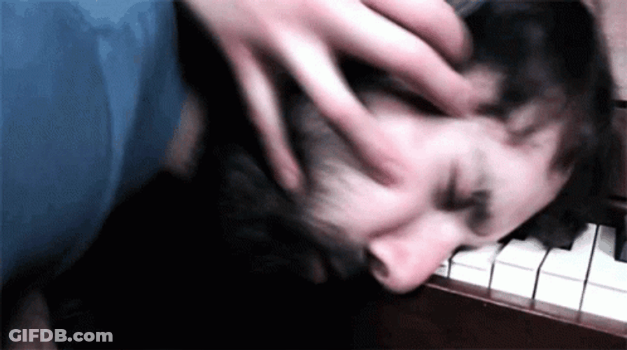 Playing Piano With Face GIF