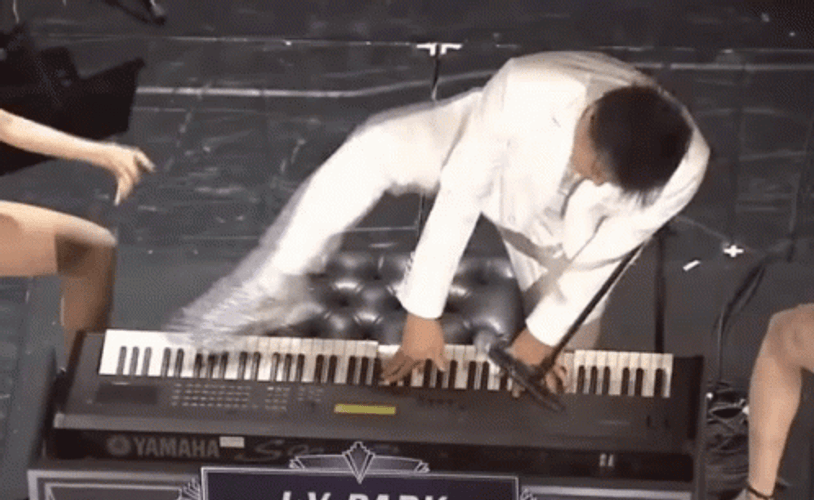 Playing Piano With Foot GIF