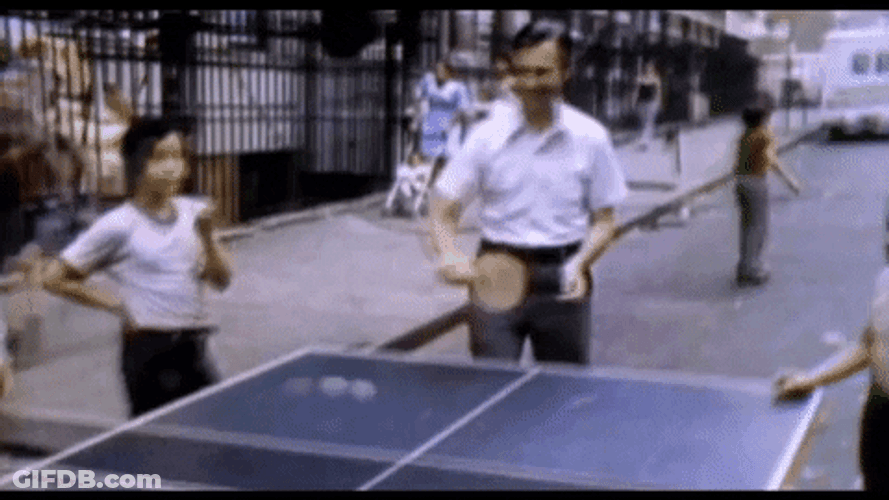 Playing Ping Pong On The Street GIF