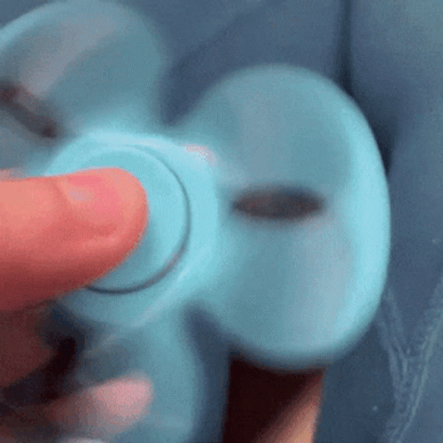 Playing The Fidget Spinner GIF