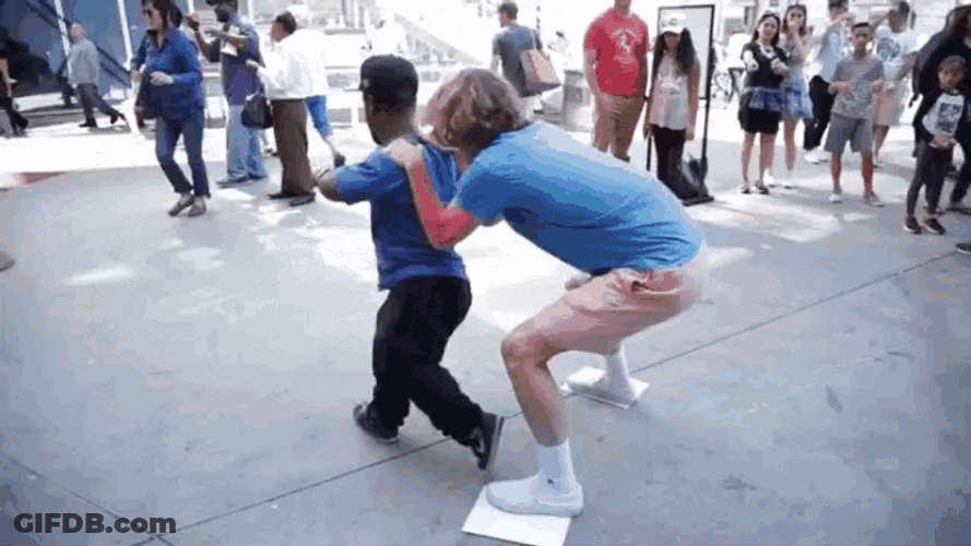 Playing With Midget Running Around Crowd GIF
