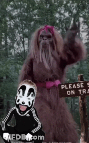 Please Stay On Trail Sign Next To Bigfoot GIF