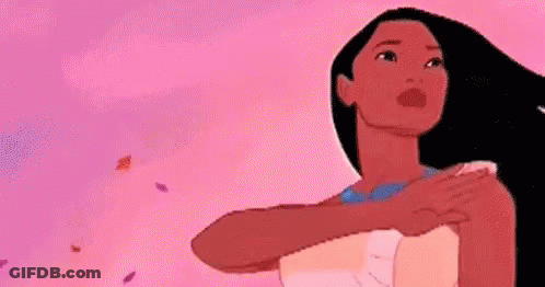 Pocahontas Standing With Leaves Flying GIF