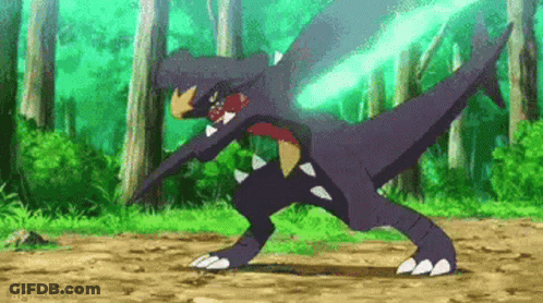 Pokemon Holding Green Light In Forest GIF