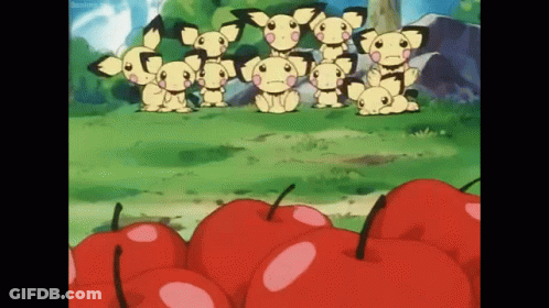 Pokemon Standing In Field With Apples GIF