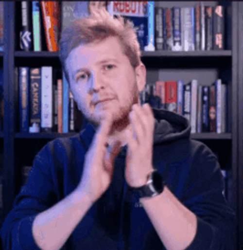 Poker Face Man Slow Clap GIF