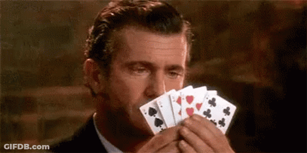Poker Face Mel Gibson Playing Cards GIF