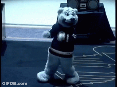 Polar Bear Mascot Dancing In Front Of Radio GIF