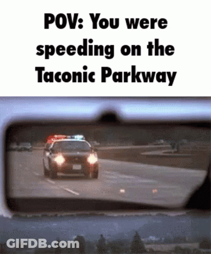 Police Car Driving Down Highway GIF