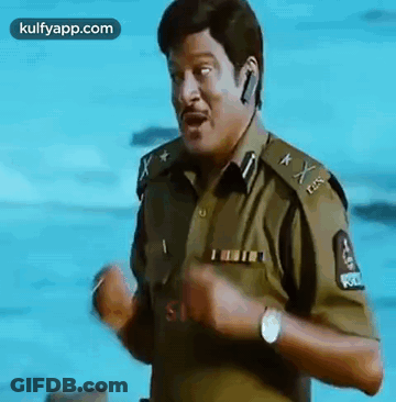 Police Man Making Funny Face By Water GIF