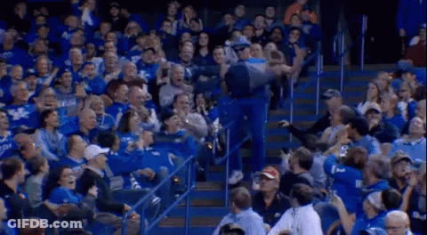 Police Man With Crowd In Blue K Shirts GIF