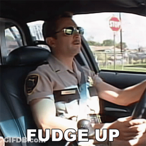 Police Officer Driving Car With Fudge Up GIF