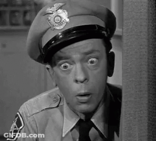 Police Officer Making Funny Face GIF