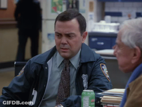 Police Officer Sitting At Table With Gatorade GIF
