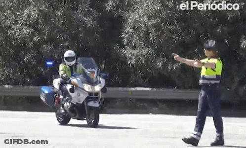 Police Officer Standing Next To Motorcycle GIF