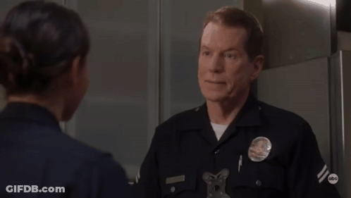 Police Officer Thumbs Down To Woman GIF